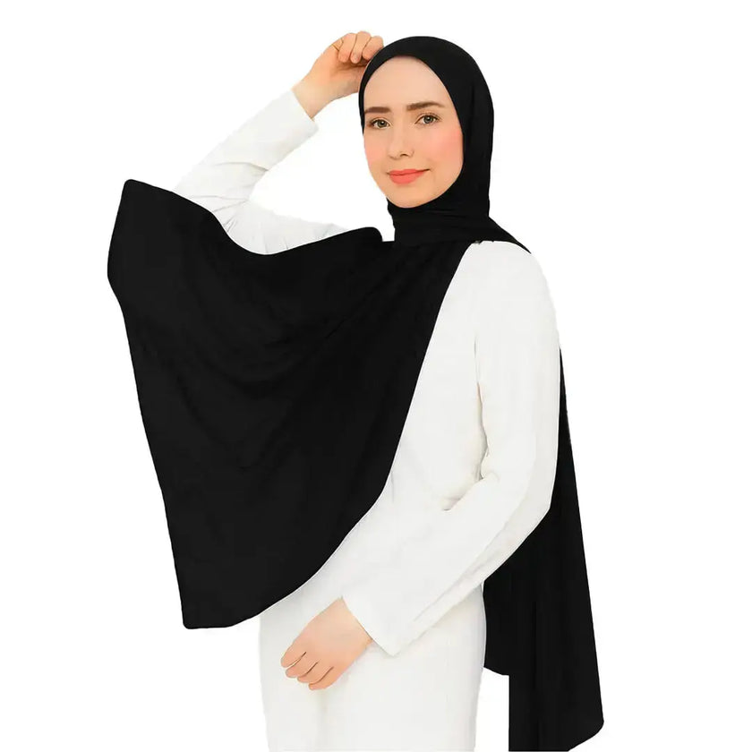 Elegant black chiffon hijab with timeless modest design
Black chiffon hijab draping softly and stylishly
Classic black hijab for versatile modest fashion | Classic Black