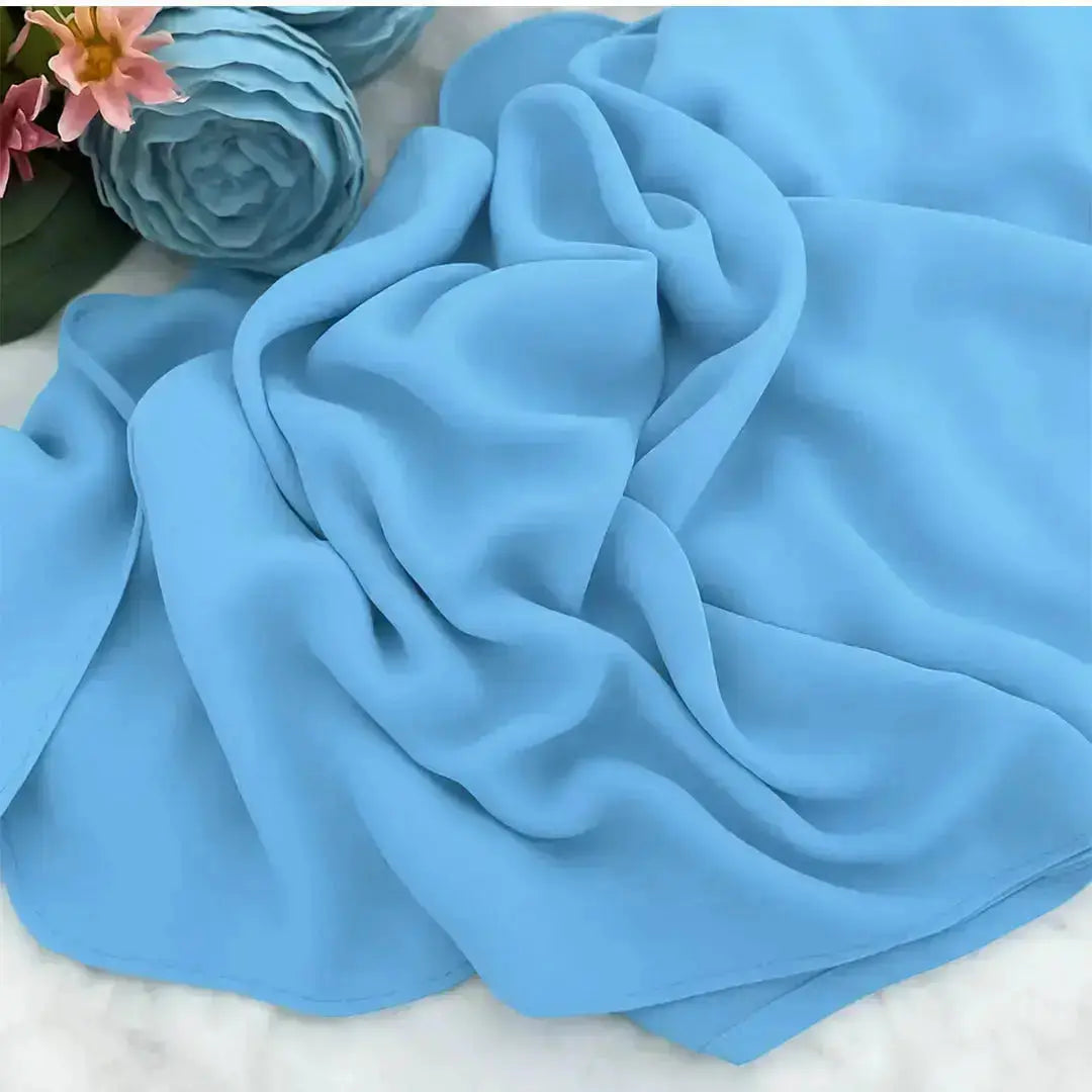 Elegant chiffon hijab in blue color, lightweight and modest
Blue chiffon hijab with soft drape and breathable fabric
Stylish blue hijab for everyday wear and occasions | Classic Blue