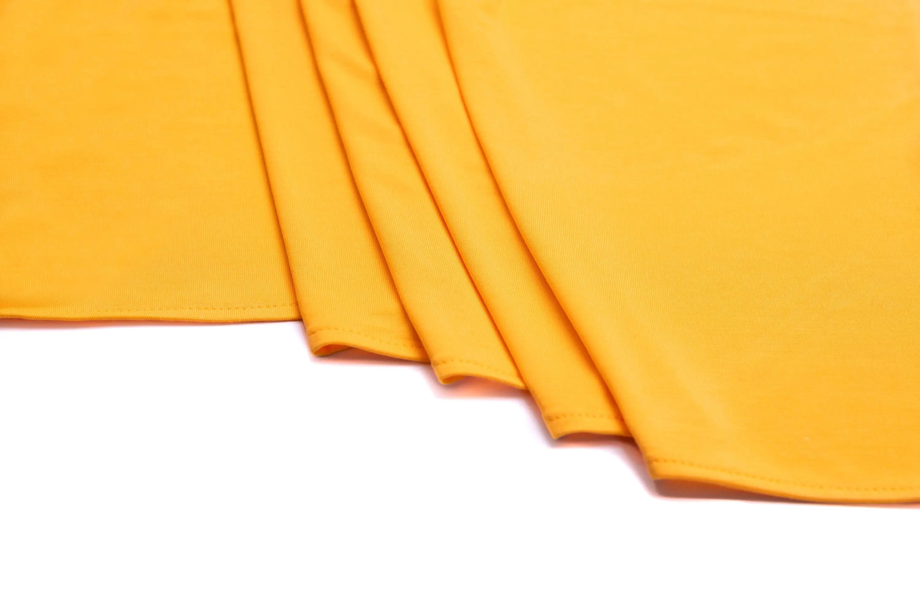 Bamboo jersey hijab, lightweight and breathable, made from eco-friendly bamboo and spandex blend. Perfect for modest fashion styling | Mustard