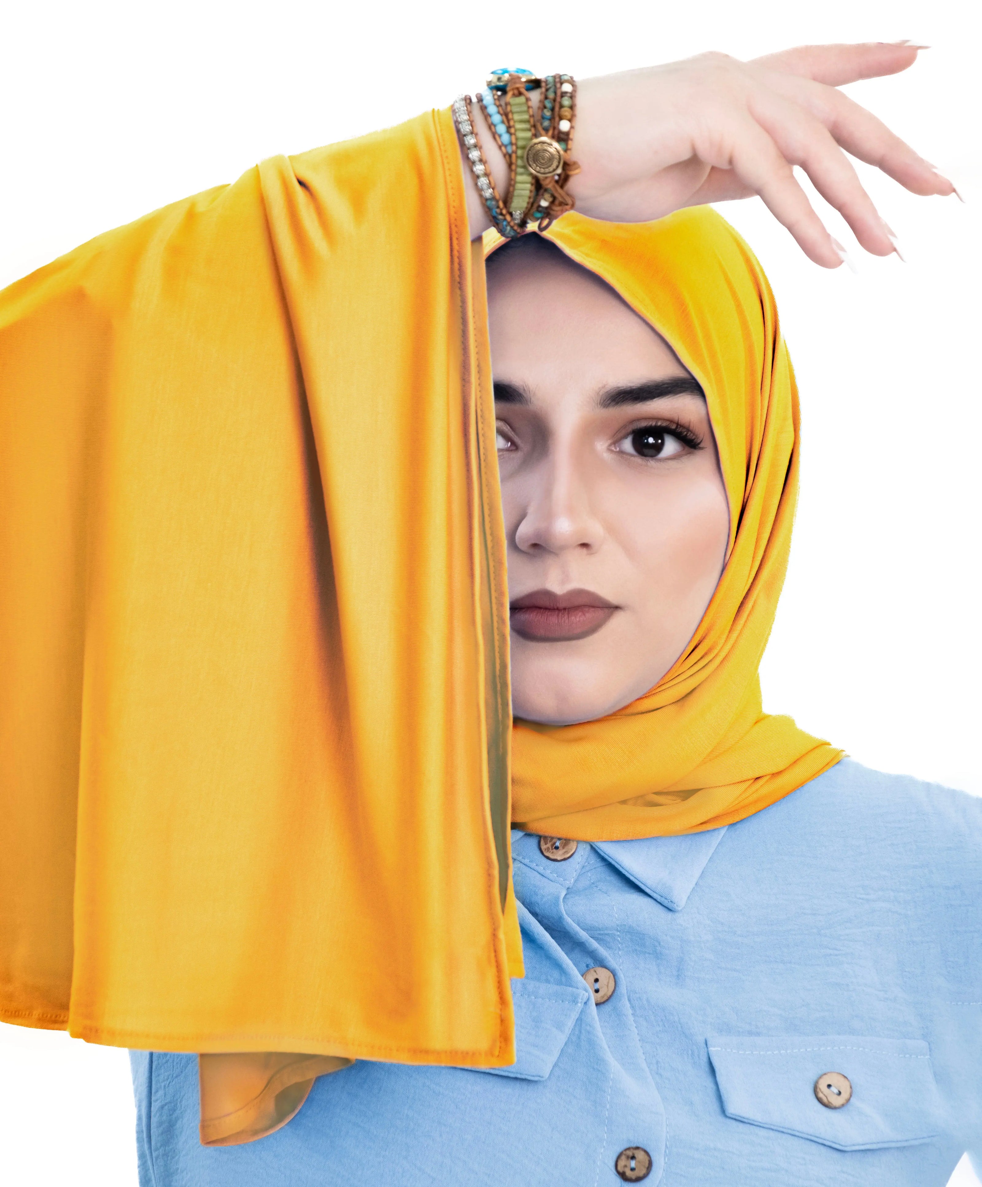 Bamboo jersey hijab, lightweight and breathable, made from eco-friendly bamboo and spandex blend. Perfect for modest fashion styling | Mustard
