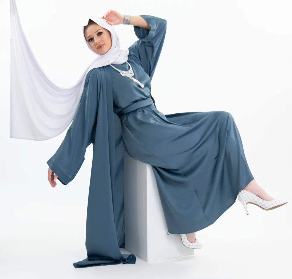 Three-piece textured silk abaya set with a flowing cardigan, matching liner, and adjustable belt for a sophisticated modest look. Lightweight, breathable | Blue