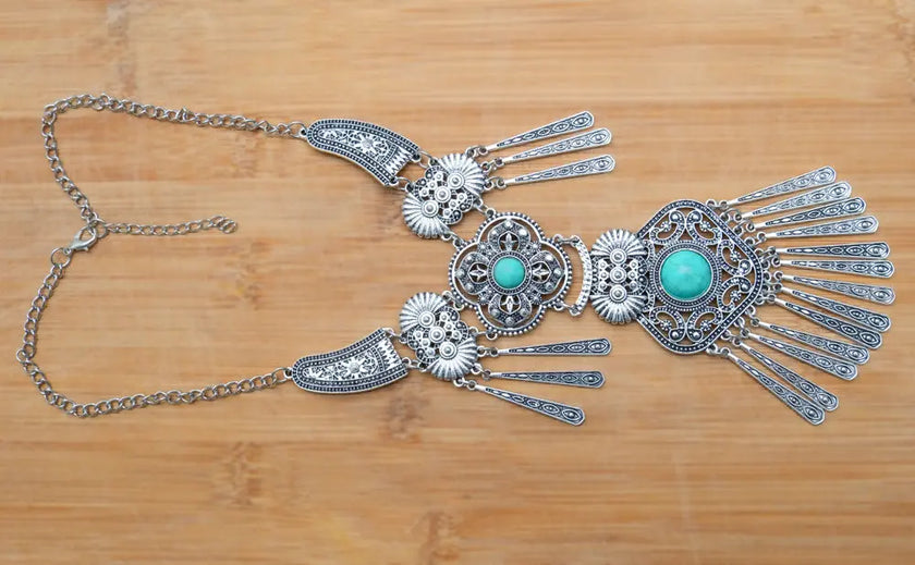 Antique silver necklace, featuring intricate detailing and timeless charm.