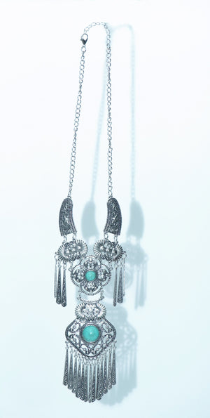 Antique silver necklace, featuring intricate detailing and timeless charm.