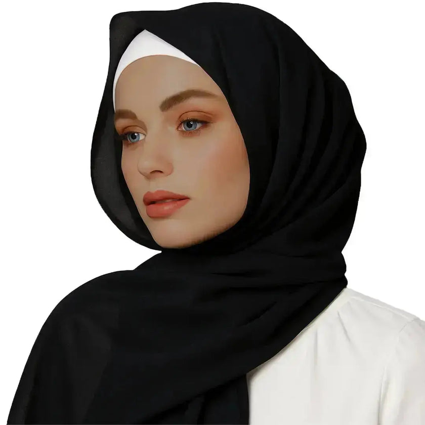 Elegant black chiffon hijab with timeless modest design
Black chiffon hijab draping softly and stylishly
Classic black hijab for versatile modest fashion | Classic Black