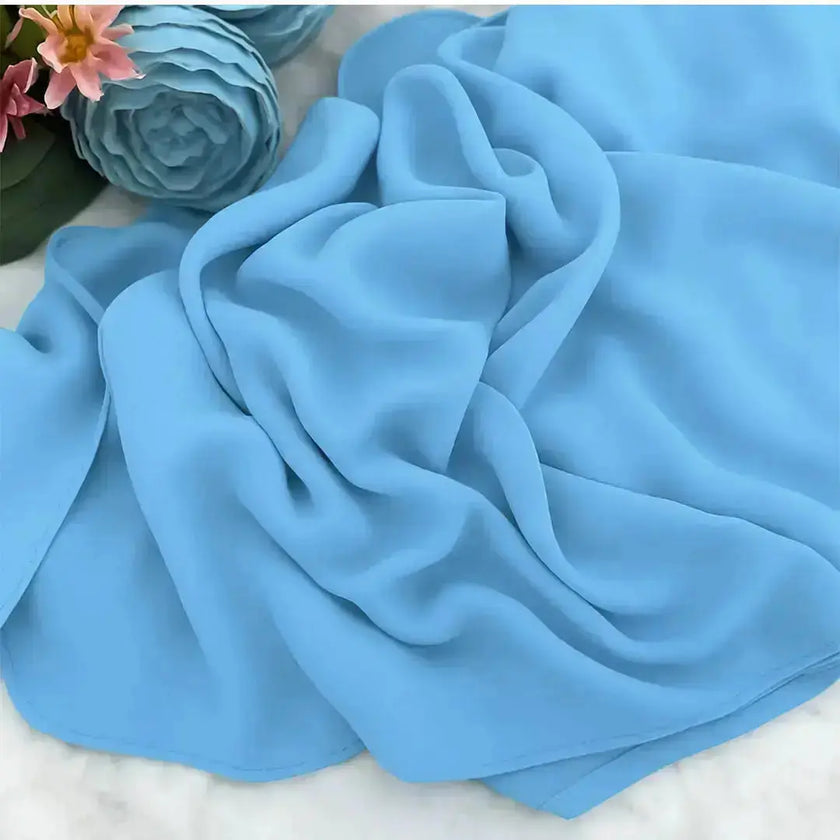 Elegant chiffon hijab in blue color, lightweight and modest
Blue chiffon hijab with soft drape and breathable fabric
Stylish blue hijab for everyday wear and occasions | Classic Blue