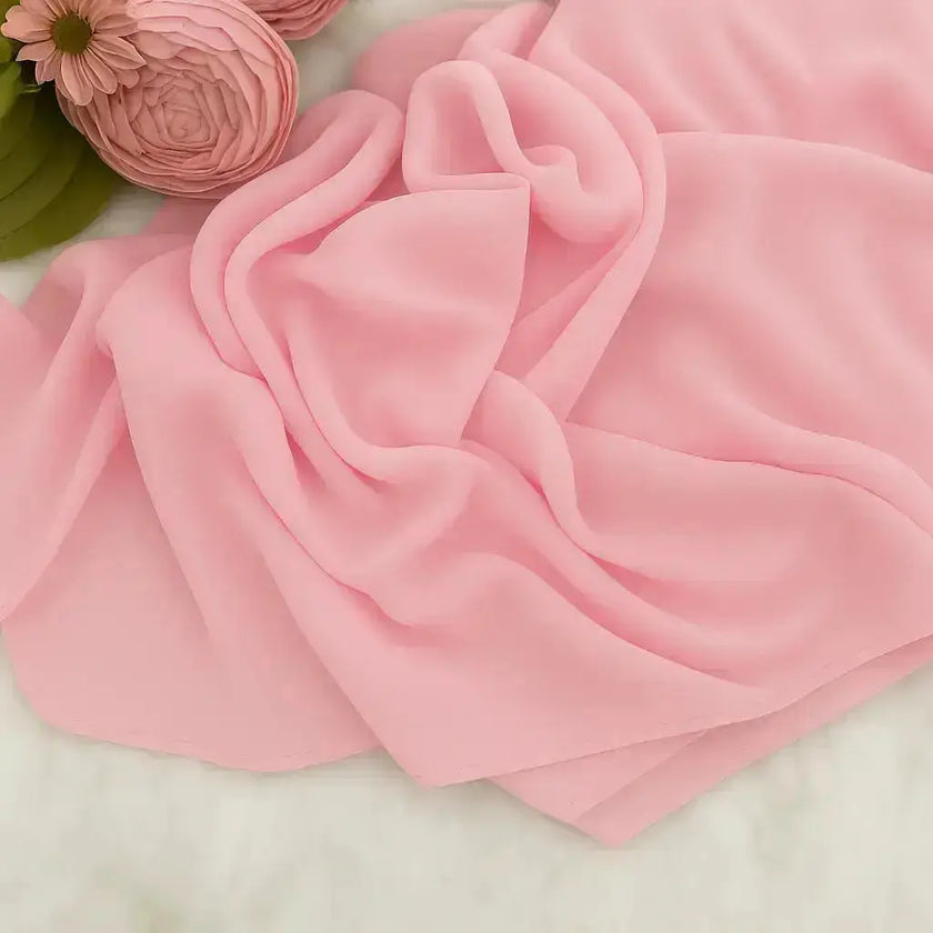 Elegant chiffon hijab in soft pink color with feminine style
Pink chiffon hijab draping beautifully, modest and elegant
Lightweight pink hijab perfect for daily wear or special occasions | Soft Pink