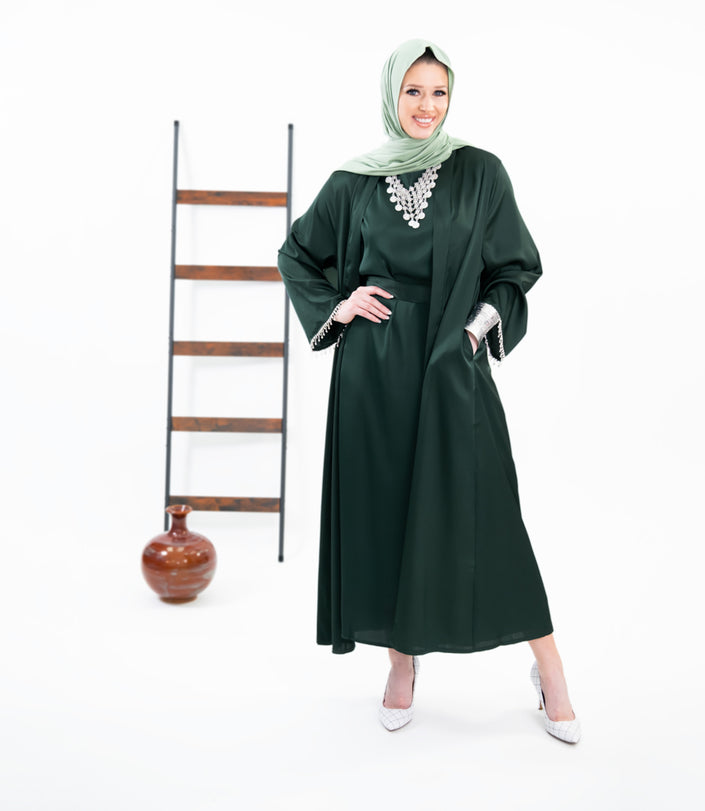 Three-piece Silk Abaya set adorned with stunning crystal lace detailing, including a flowing gown, matching liner, and coordinating belt | Green