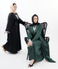 Three-piece Silk Abaya set adorned with stunning crystal lace detailing, including a flowing gown, matching liner, and coordinating belt | Green Black