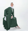 Three-piece silk Abaya set crafted from premium silk fabric, showcasing a captivating textured lines pattern. Includes a flowing gown, matching liner, and coordinating belt | Green