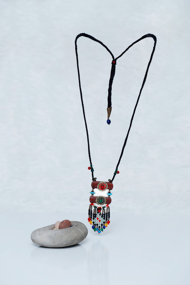 Hippie style long necklace featuring eclectic beads and bohemian-inspired elements | Red