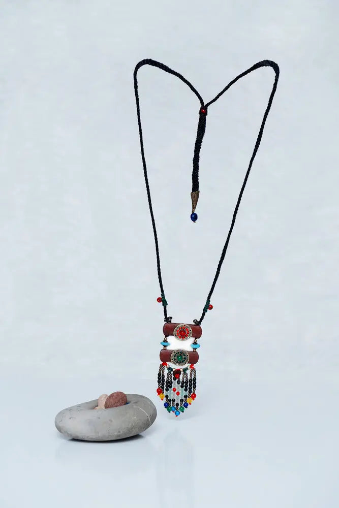 Hippie style long necklace featuring eclectic beads and bohemian-inspired elements | Red