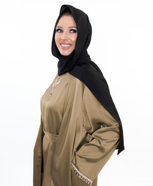 Three-piece Silk Abaya set adorned with stunning crystal lace detailing, including a flowing gown, matching liner, and coordinating belt | Light Gold