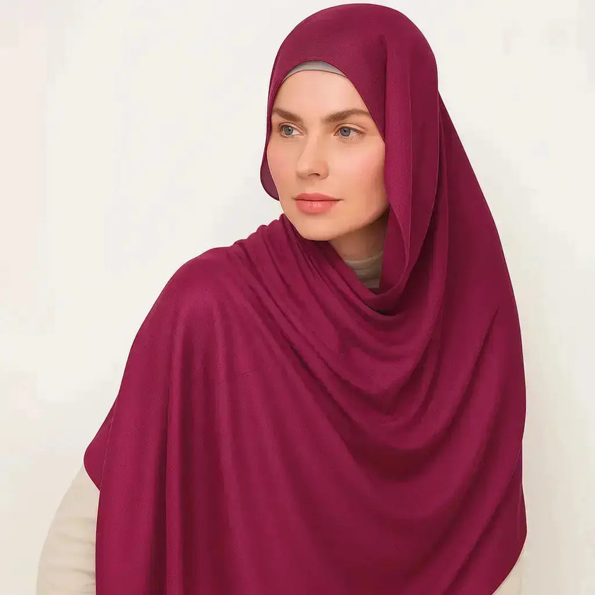 Berry Rouge Madina Silk Hijab – Deep berry-red, soft, non-slip, breathable fabric. Semi-matte finish with a smooth texture, perfect for elegant modest wear. | Berry Rouge