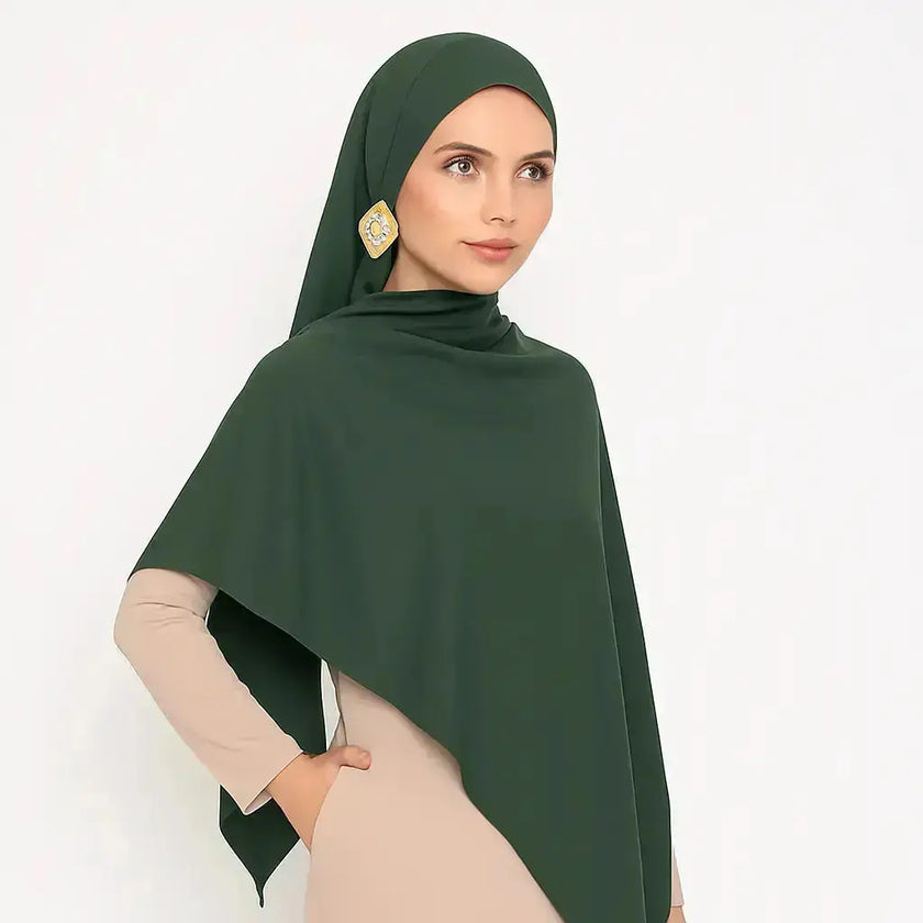 Emerald Mist Madina Silk Hijab – Deep green, soft, non-slip, and breathable fabric. Semi-matte finish with a smooth texture, perfect for modest fashion. | Emerald Mist
