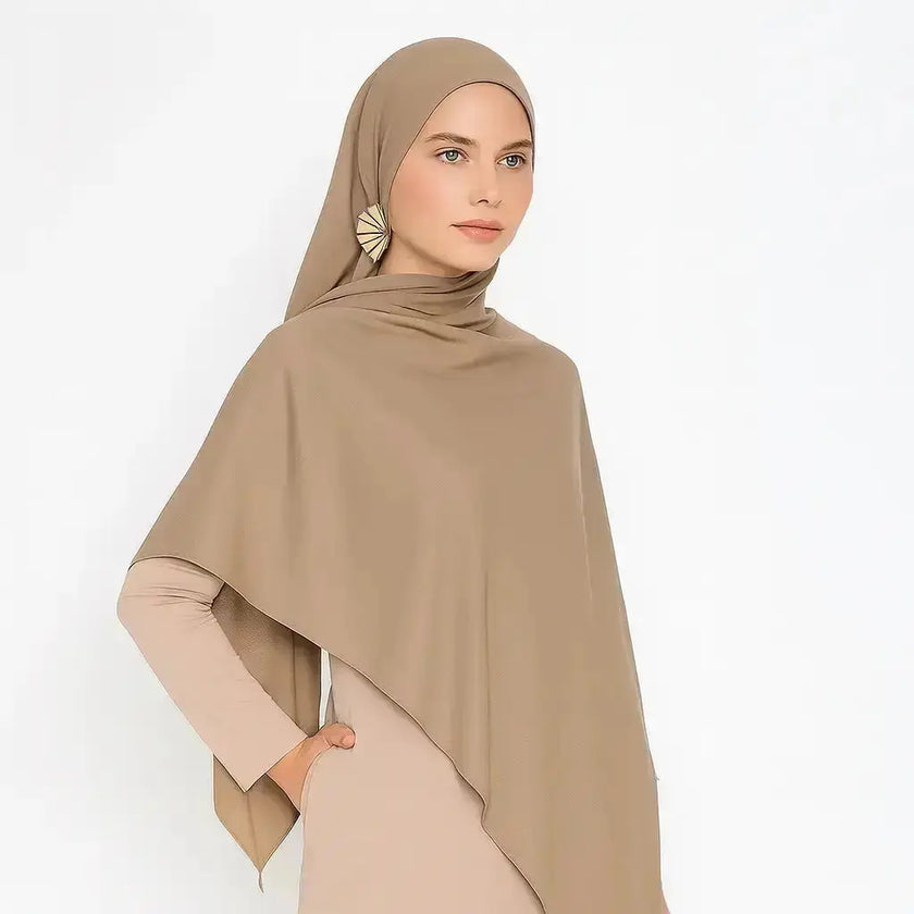 Camel Beige Madina Silk Hijab with a soft, matte finish. Breathable, lightweight, and non-slip fabric, perfect for elegant and comfortable modest fashion styling. | Camel Beige