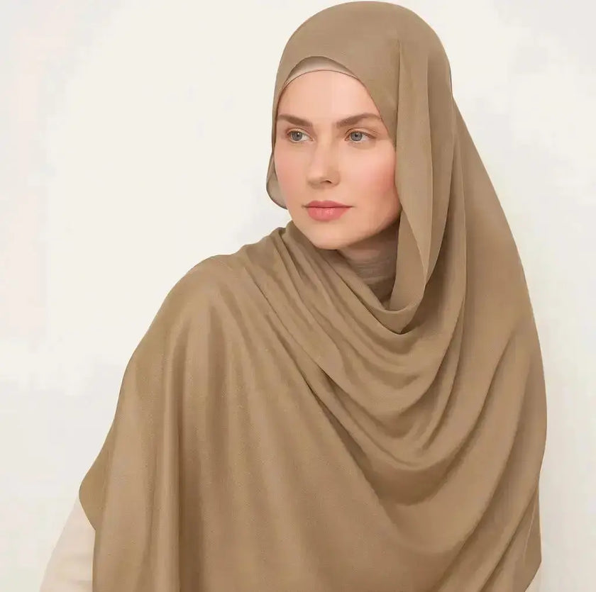 Camel Beige Madina Silk Hijab with a soft, matte finish. Breathable, lightweight, and non-slip fabric, perfect for elegant and comfortable modest fashion styling. | Camel Beige