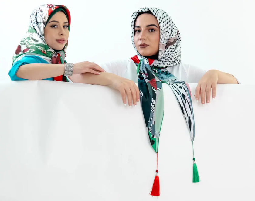 Luxurious Palestinian silk hijab scarf featuring intricate cultural designs.