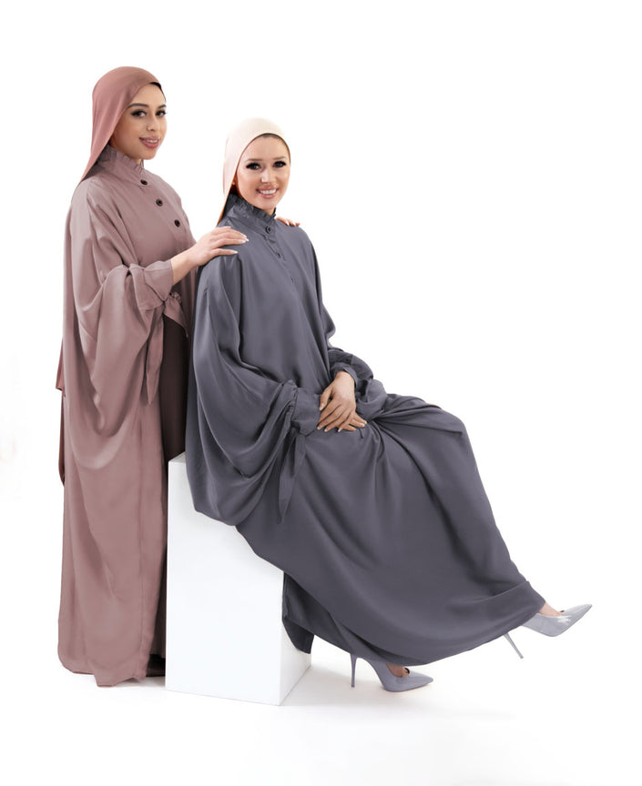 Soft silk stylish abaya featuring bow sleeves, crafted for comfort and sophistication| Pink Purple