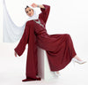 Three-piece silk Abaya set crafted from premium silk fabric, showcasing a captivating textured lines pattern. Includes a flowing gown, matching liner, and coordinating belt | Red