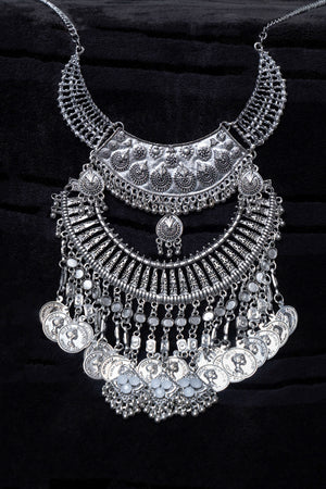 Antique silver necklace, featuring intricate detailing and timeless charm.