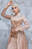 Champagne blush satin modest gown with beaded long sleeves, high neckline, and a dramatic floor-length cape. Elegant formal dress for weddings or events.