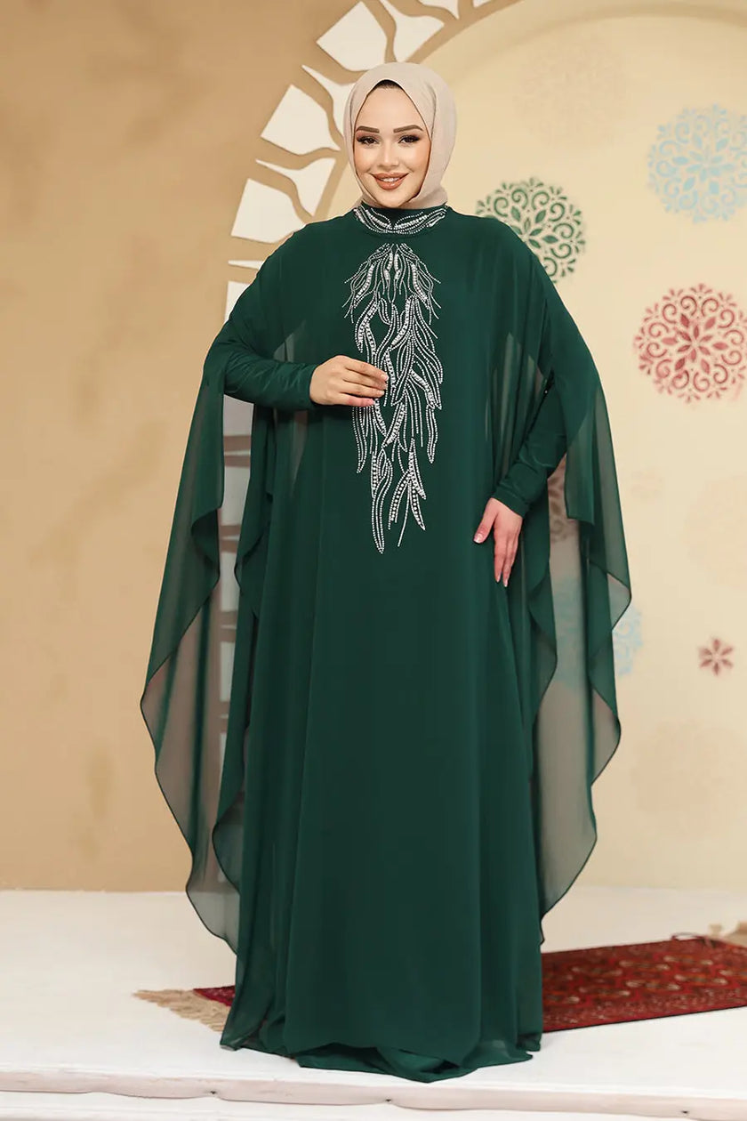 Emerald Green crepe abaya in kaftan style with silver embellishment detail. Flowy chiffon sleeves and modest design perfect for weddings or formal events.