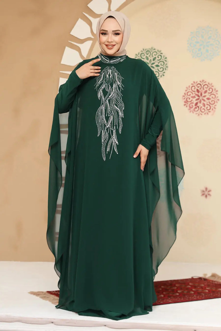 Emerald Green crepe abaya in kaftan style with silver embellishment detail. Flowy chiffon sleeves and modest design perfect for weddings or formal events.