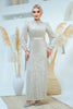 A woman wearing a modest silver sequin maxi gown with a satin waist belt, perfect for formal events and Eid – Zari Hijabeez